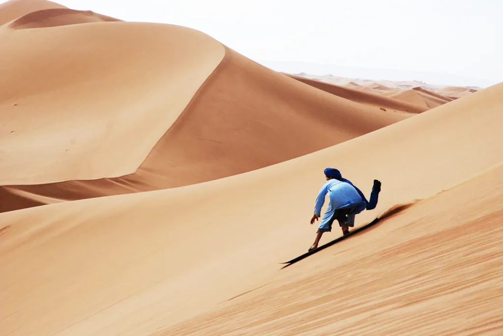 Sandboarding in Moroccos Sahara Desert